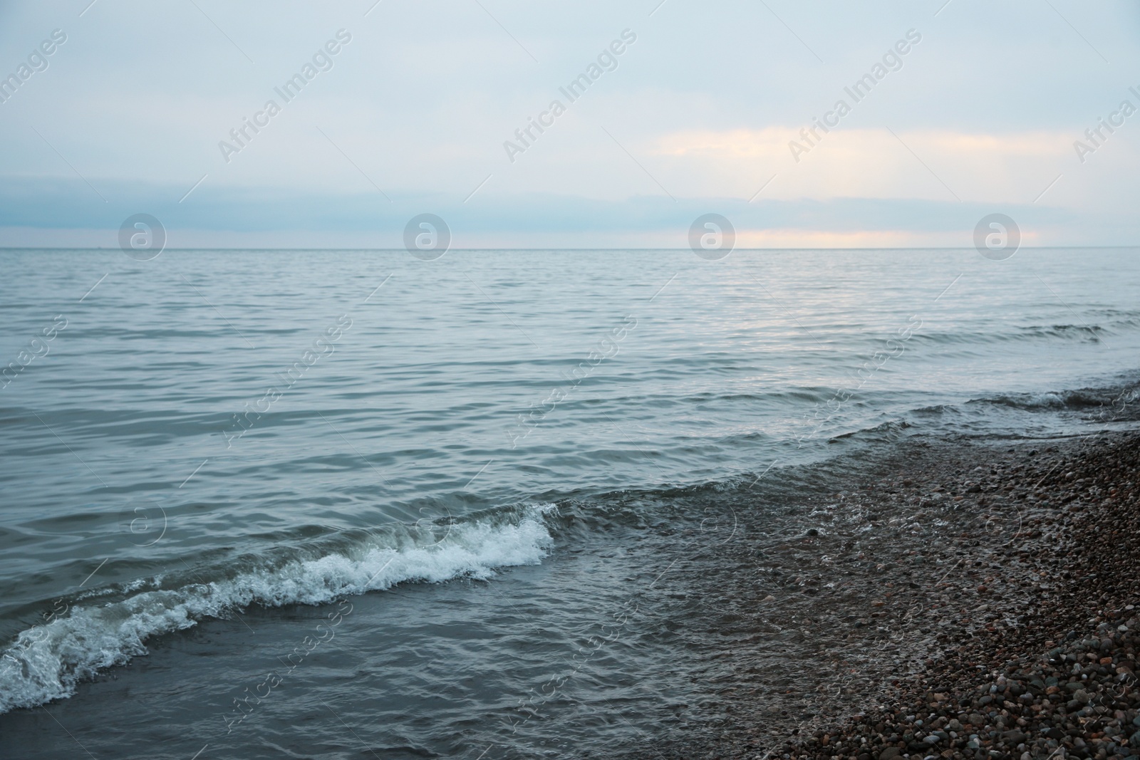 Photo of Picturesque view of beautiful sea shore under sky