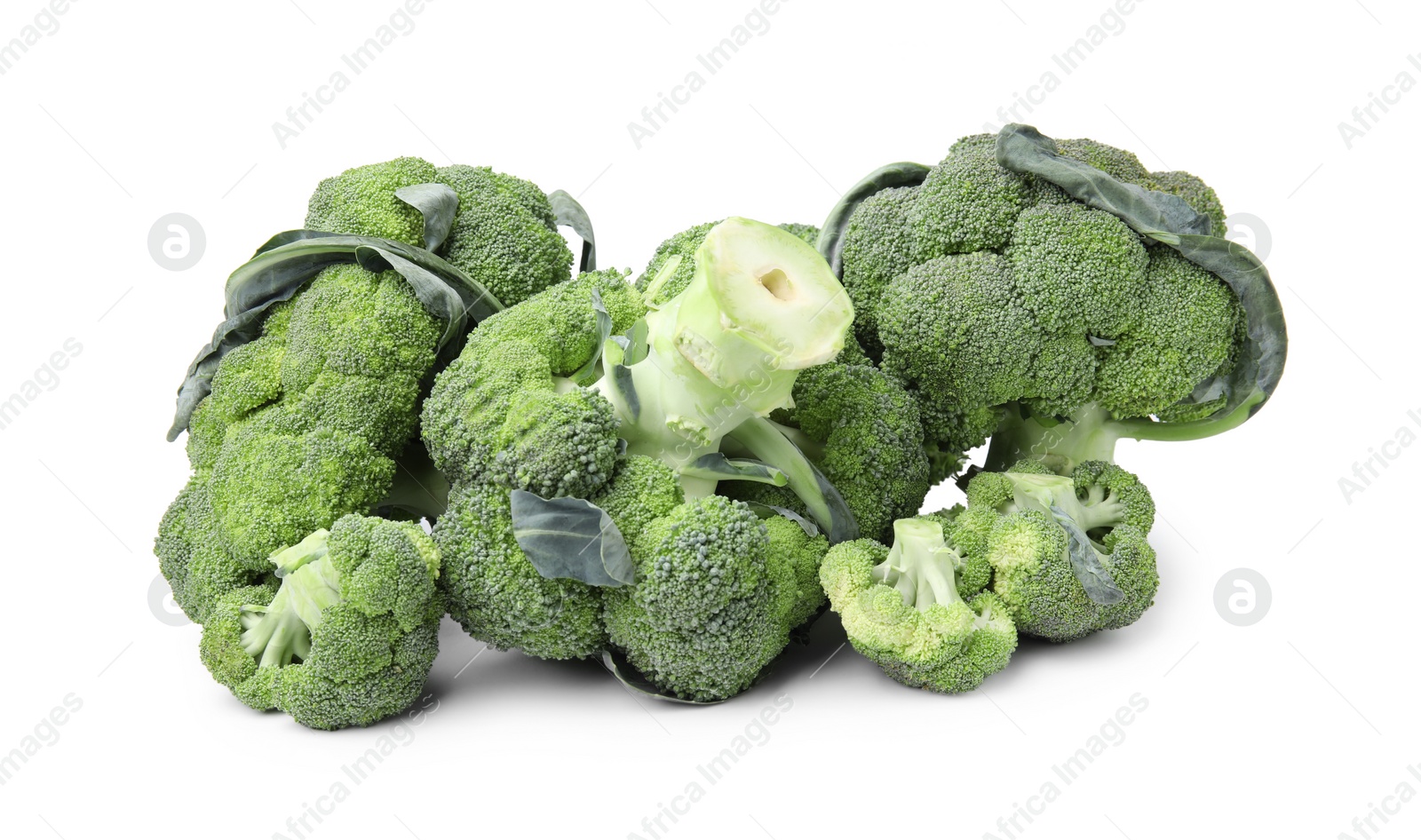 Photo of Pile of fresh raw green broccoli isolated on white