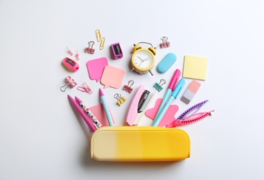 Photo of Flat lay composition with school stationery on white background. Back to school