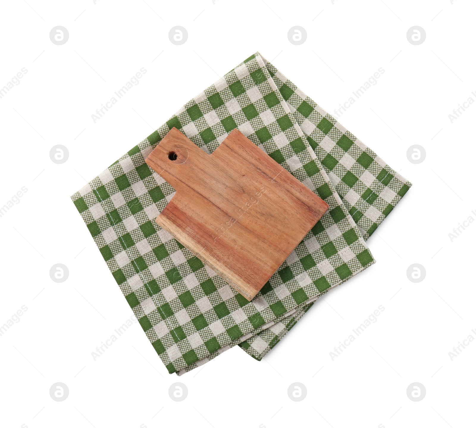 Photo of Wooden cutting board and checkered towel isolated on white, top view