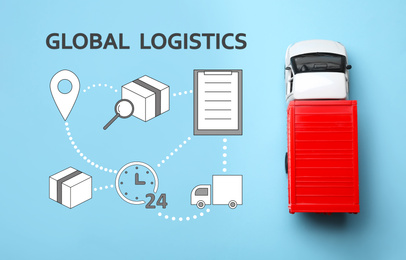 Image of Global logistics concept. Truck and icons on light blue background