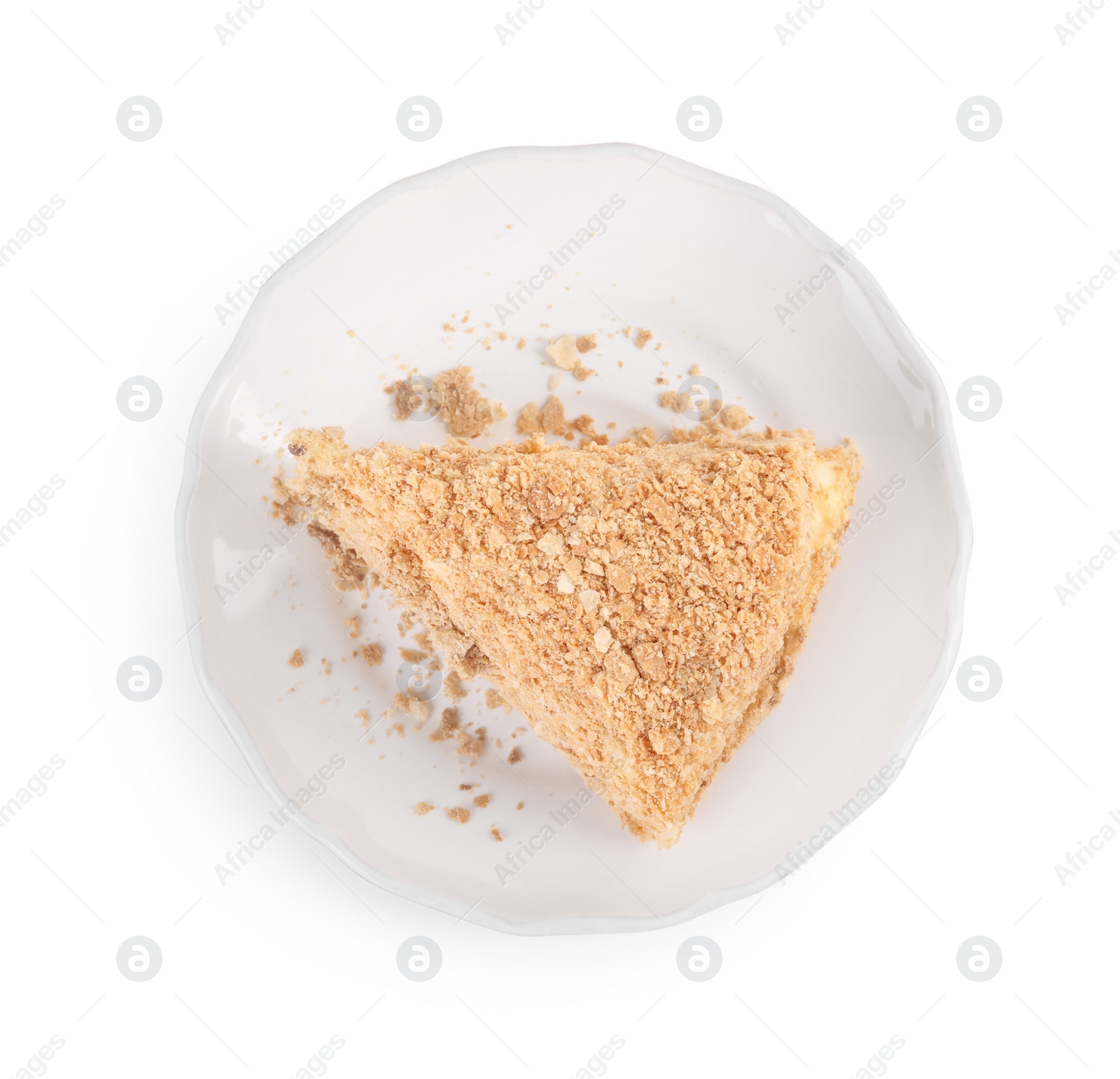 Photo of Piece of delicious Napoleon cake isolated on white, top view