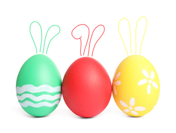 Image of Colorful Easter eggs with cute bunny ears isolated on white