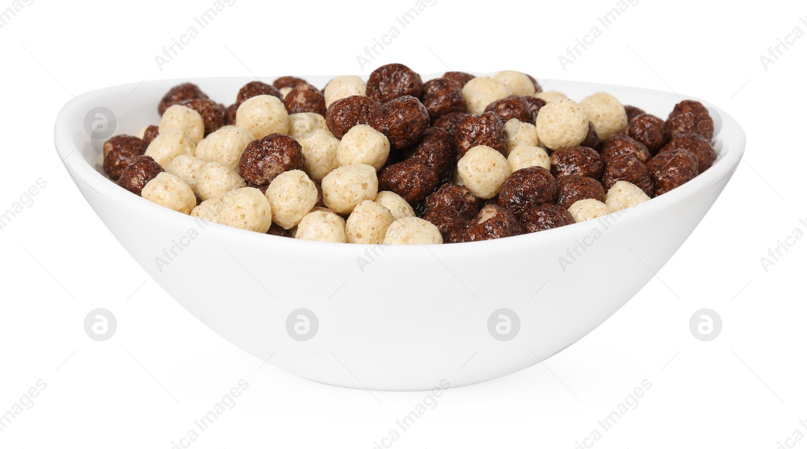 Photo of Tasty sweet cereal balls in bowl isolated on white