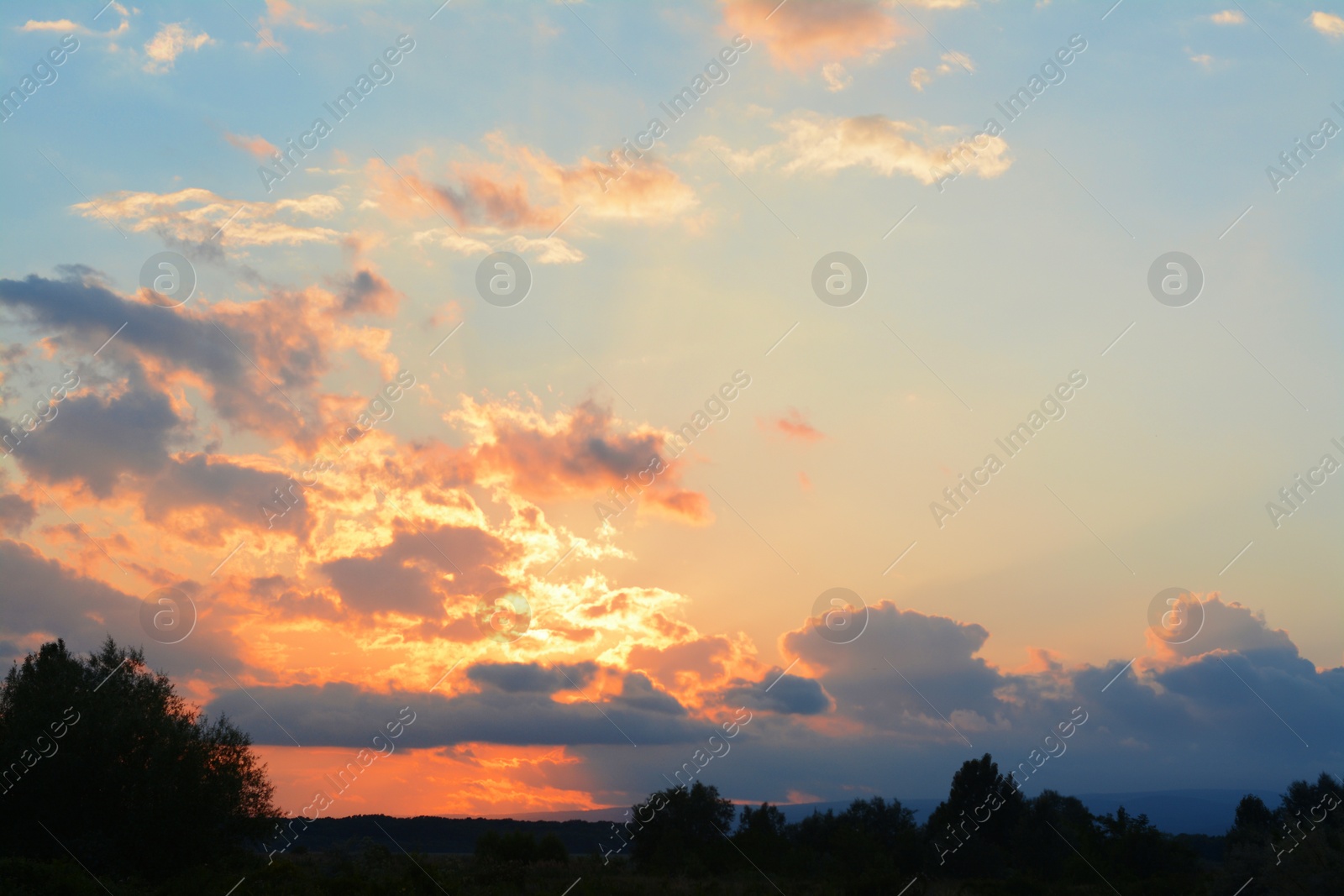 Photo of Picturesque view of beautiful countryside at sunset