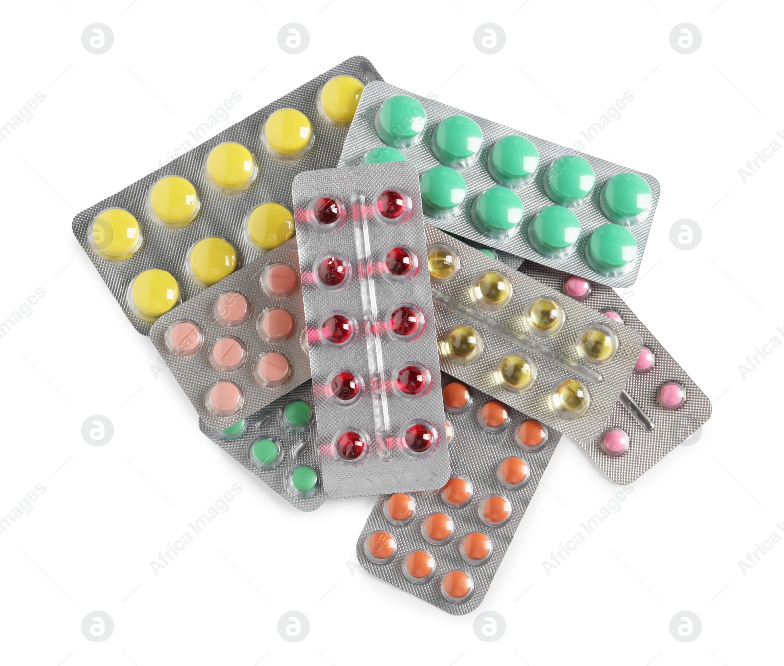 Photo of Blisters with different pills on white background, top view