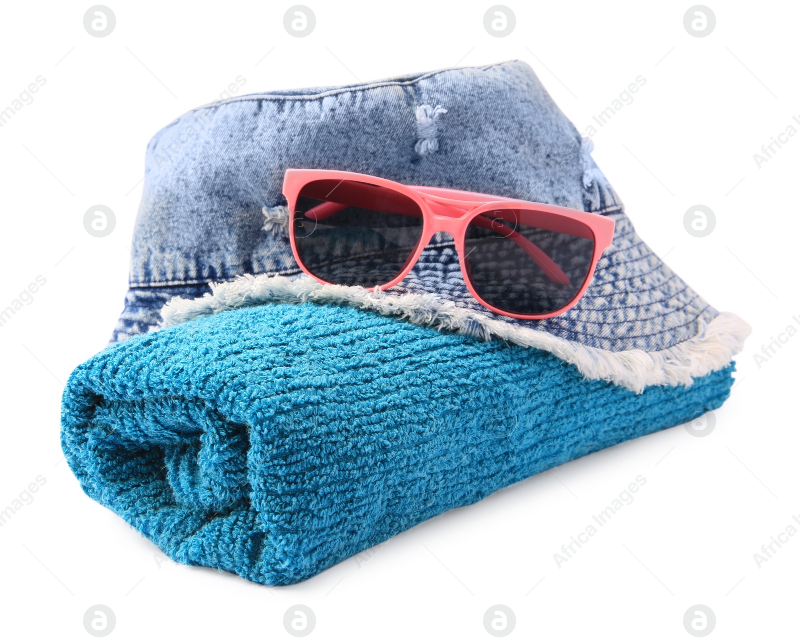 Photo of Denim hat, terry towel and sunglasses isolated on white. Beach objects