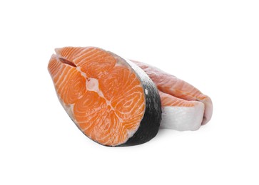 Photo of Fresh raw salmon steaks on white background