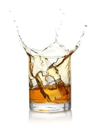 Photo of Whiskey splashing out of glass on white background