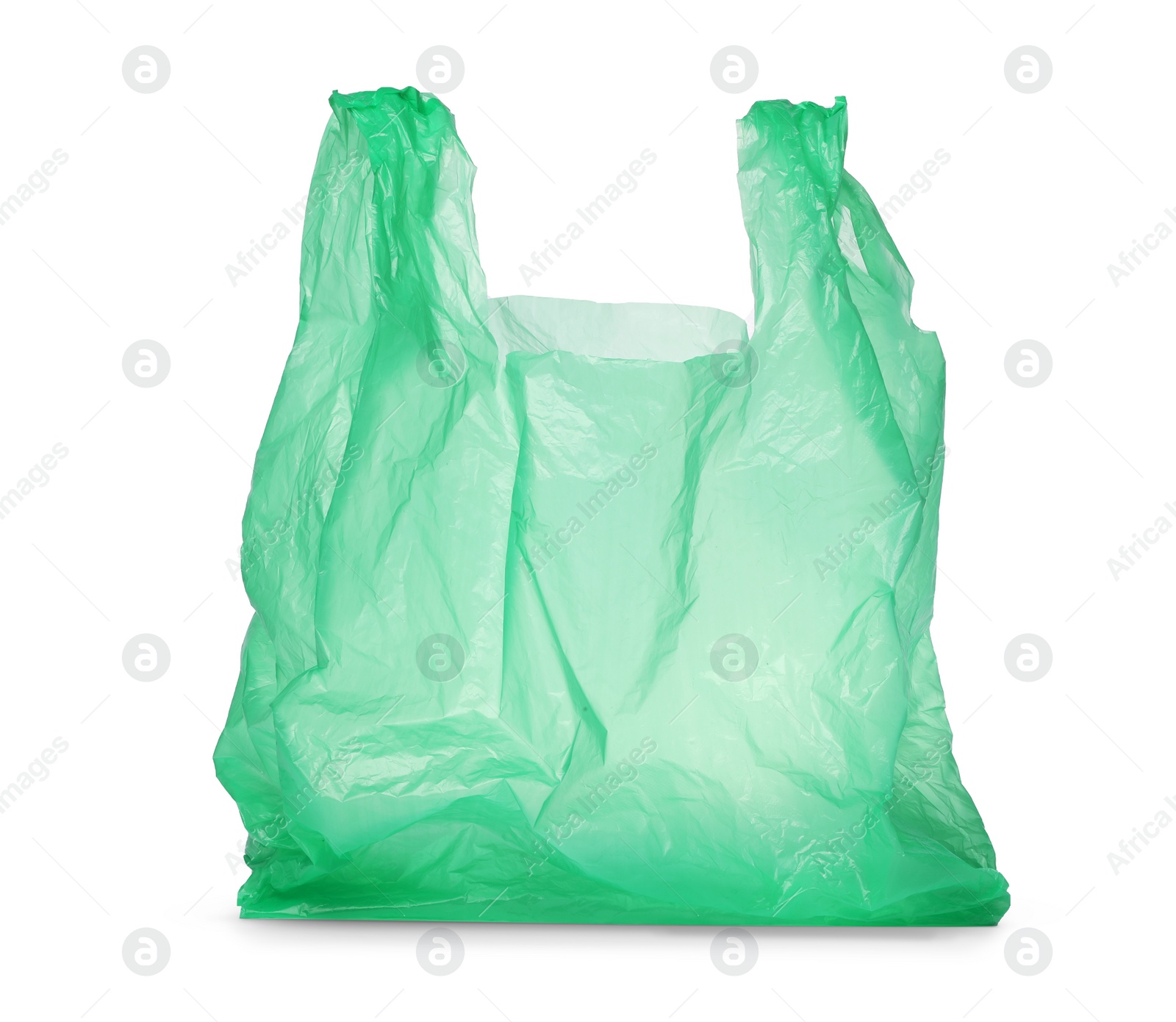 Photo of One green plastic bag isolated on white