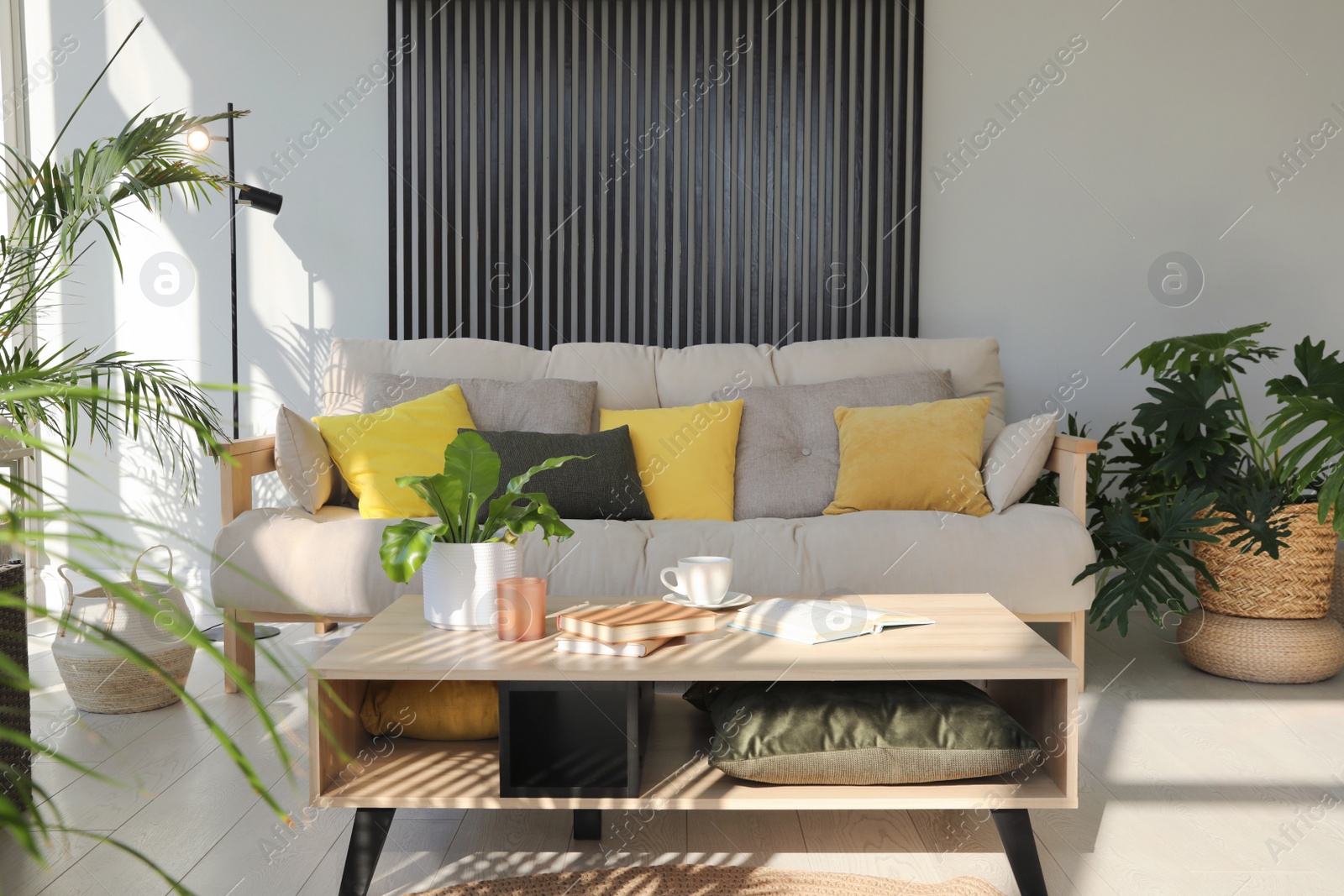 Photo of Indoor terrace interior with modern furniture and houseplants