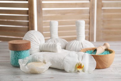Photo of Spa composition with skin care products on white wooden table