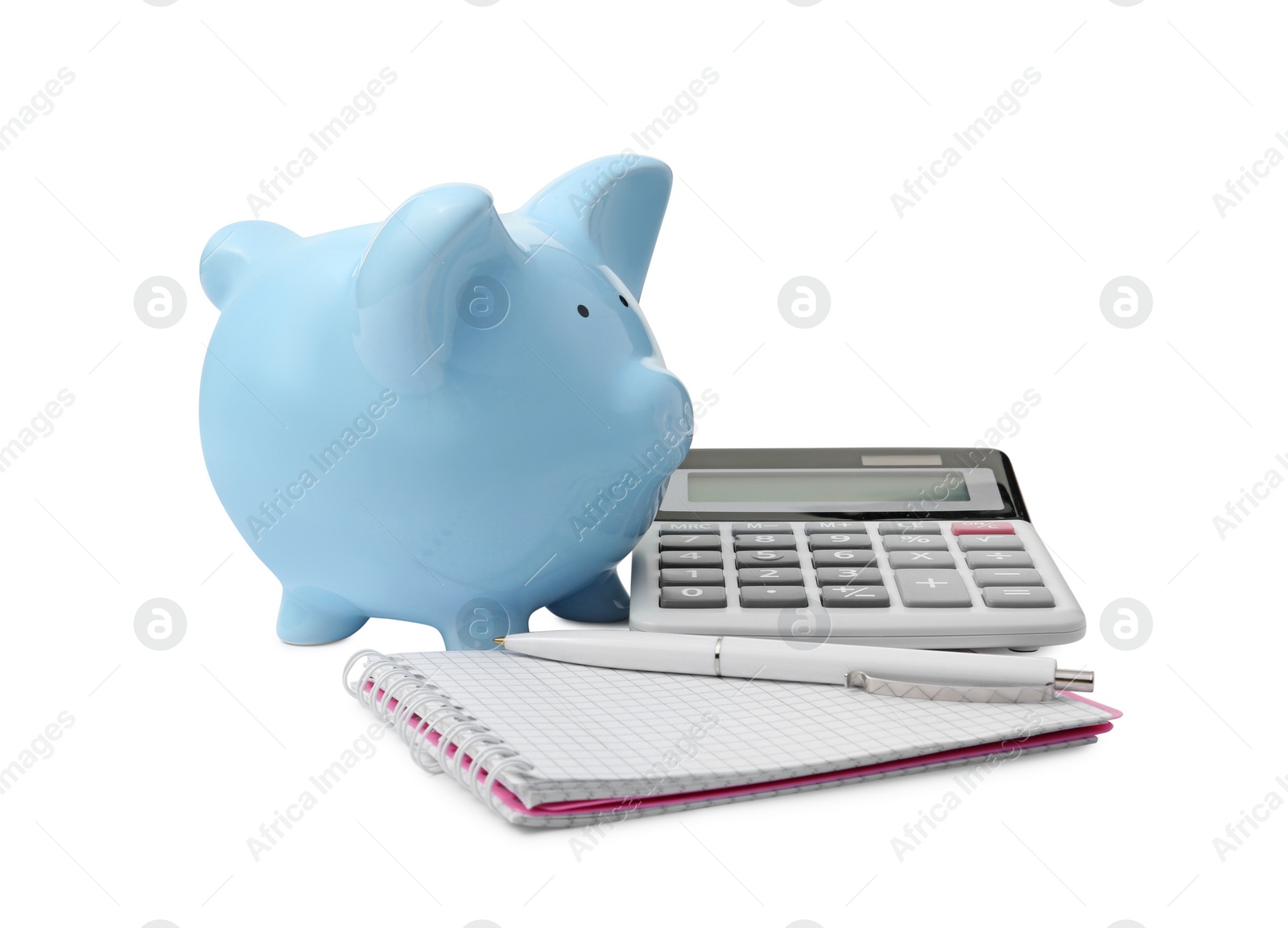 Photo of Calculator, piggy bank, pen and notebook isolated on white