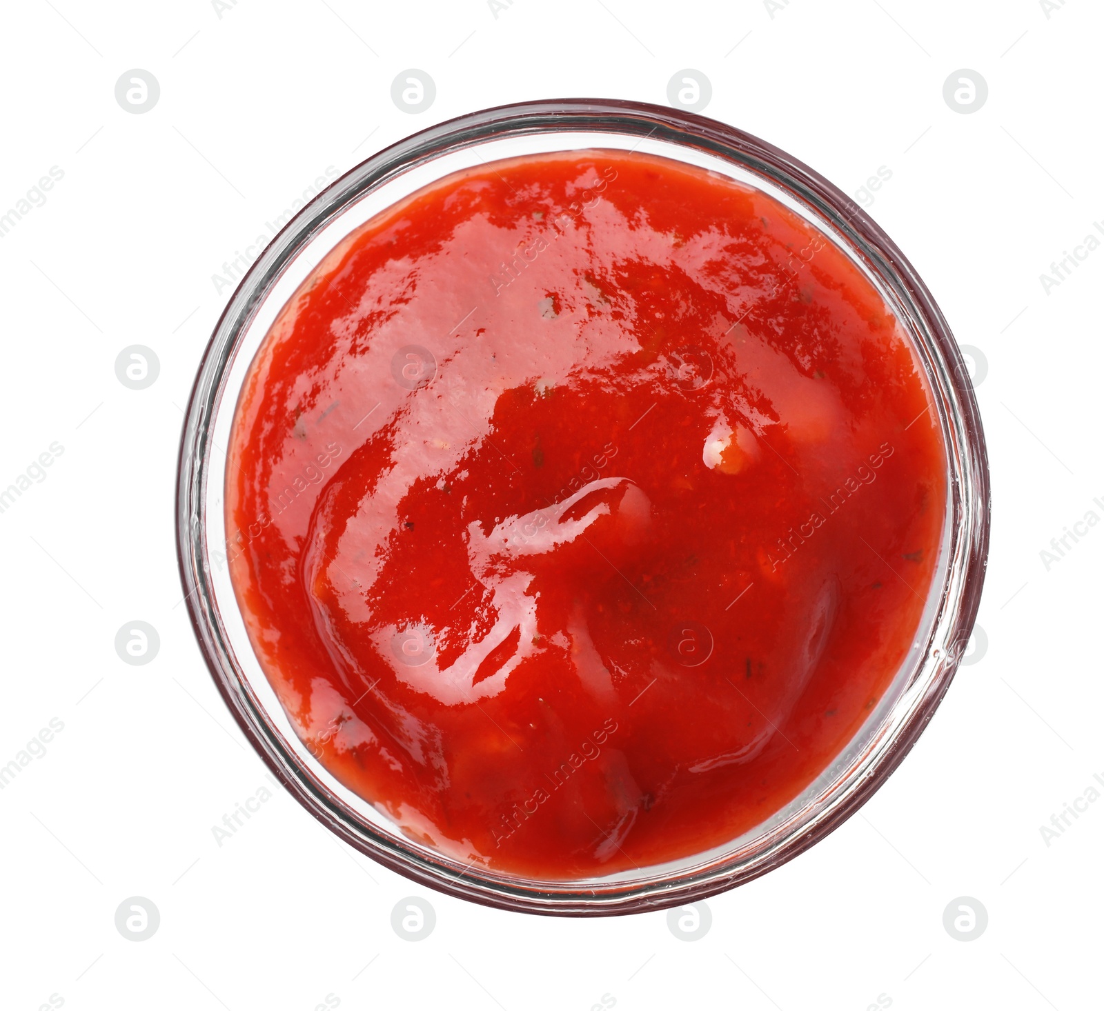 Photo of Bowl with red sauce isolated on white, top view