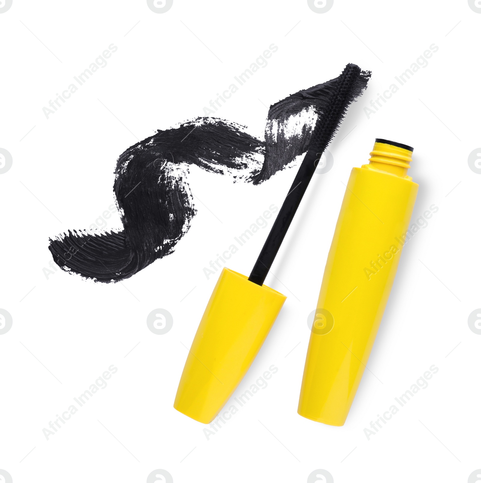 Photo of Applicator, mascara for eyelashes and black smear on white background, top view