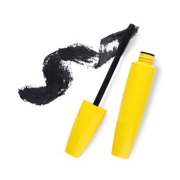 Photo of Applicator, mascara for eyelashes and black smear on white background, top view