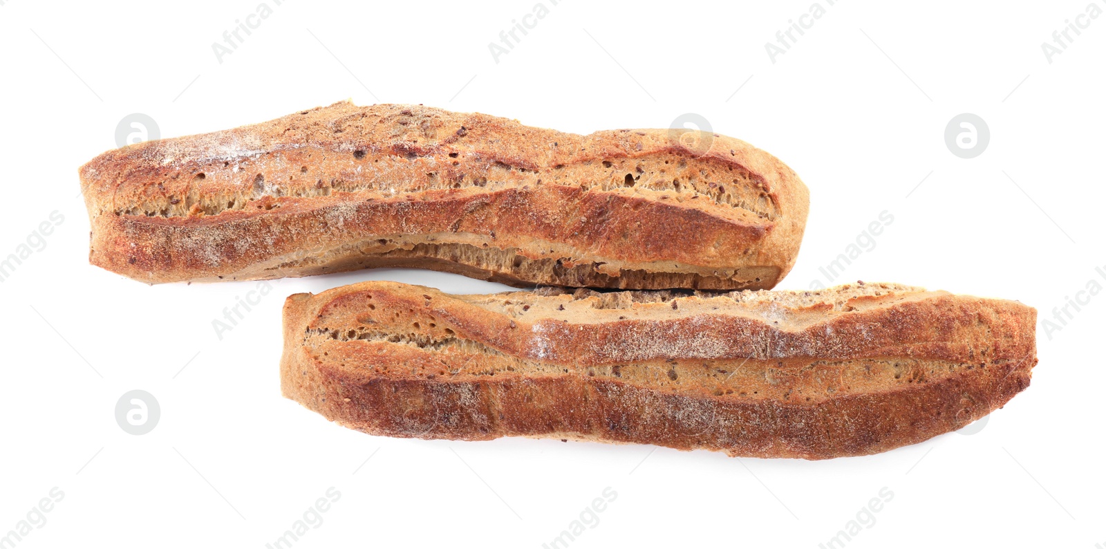 Photo of Tasty buckwheat baguettes on white background, top view. Fresh bread