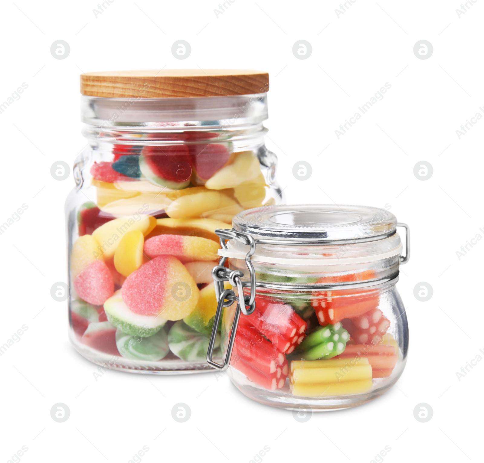 Photo of Jars with tasty jelly candies on white background