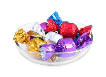 Bowl with many tasty candies in colorful wrappers isolated on white