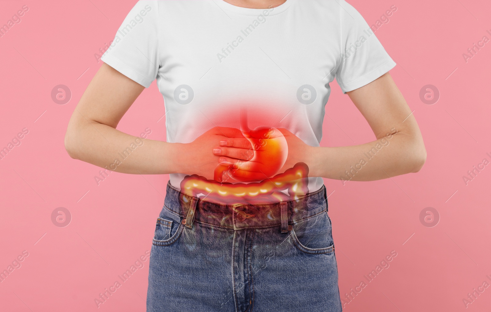 Image of Woman suffering from stomach ache on pink background, closeup. Illustration of unhealthy gastrointestinal tract
