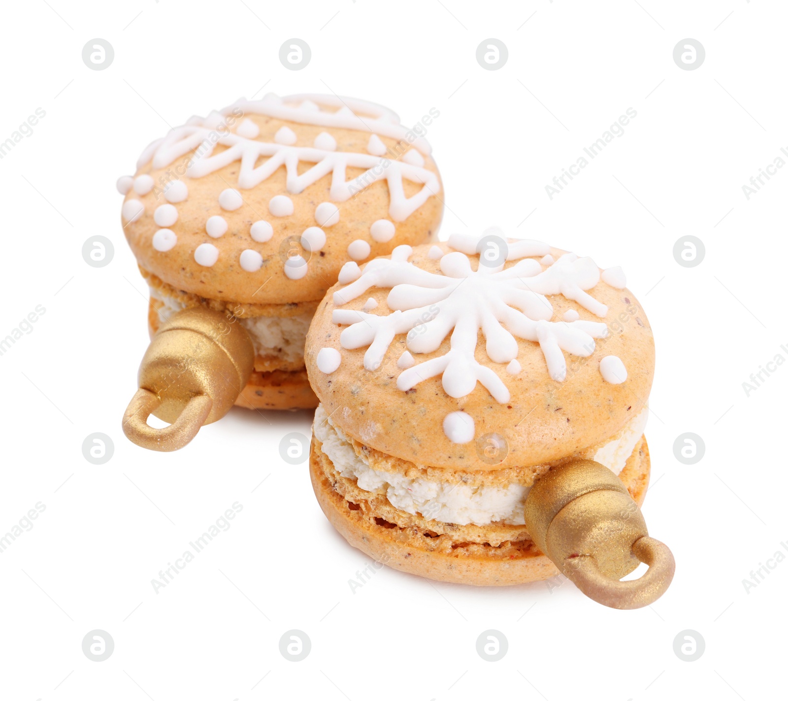 Photo of Beautifully decorated Christmas macarons on white background