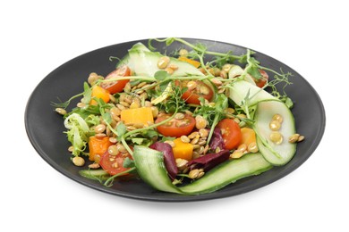 Photo of Plate of delicious salad with lentils and vegetables isolated on white