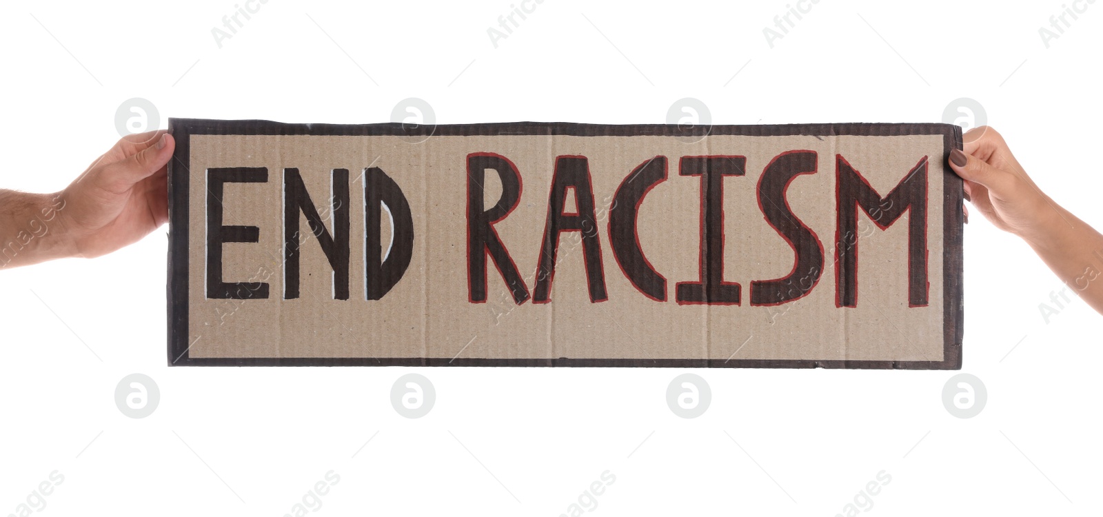 Photo of Man and woman holding sign with phrase End Racism on white background, closeup