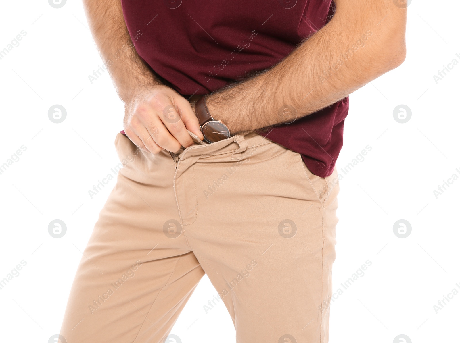 Photo of Man scratching crotch on white background, closeup. Annoying itch