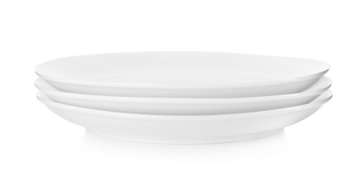 Stack of ceramic plates isolated on white