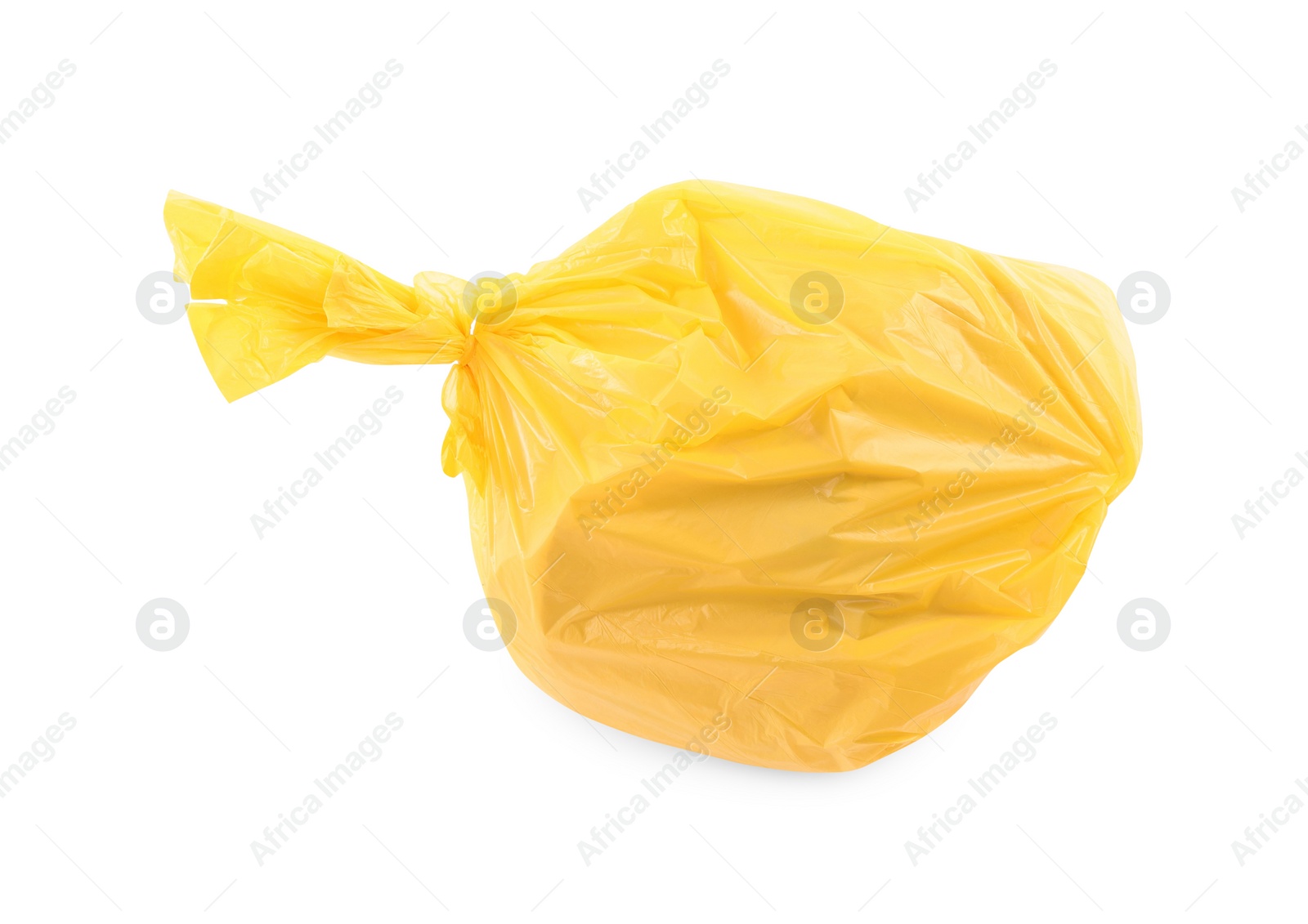 Photo of Yellow plastic garbage bag isolated on white