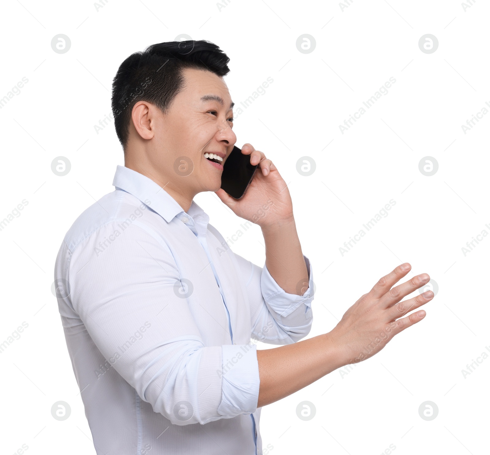 Photo of Businessman in formal clothes talking on phone against white background