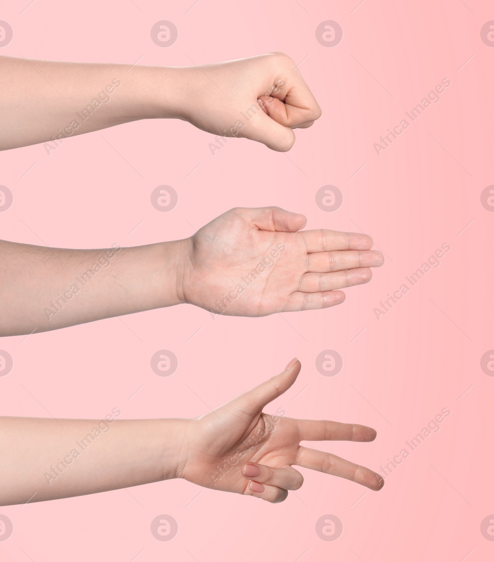 Image of People playing rock, paper and scissors on pink background, closeup