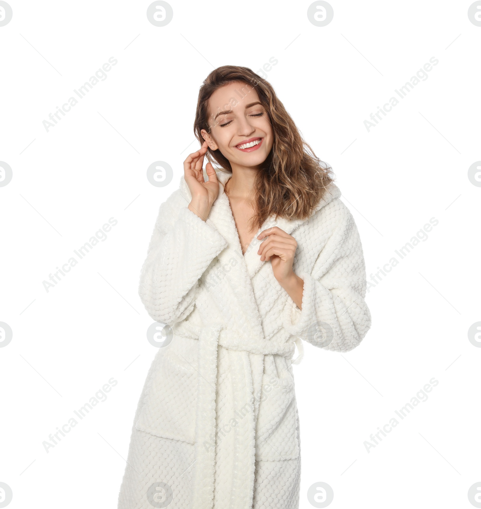 Photo of Beautiful young woman wearing bathrobe on white background