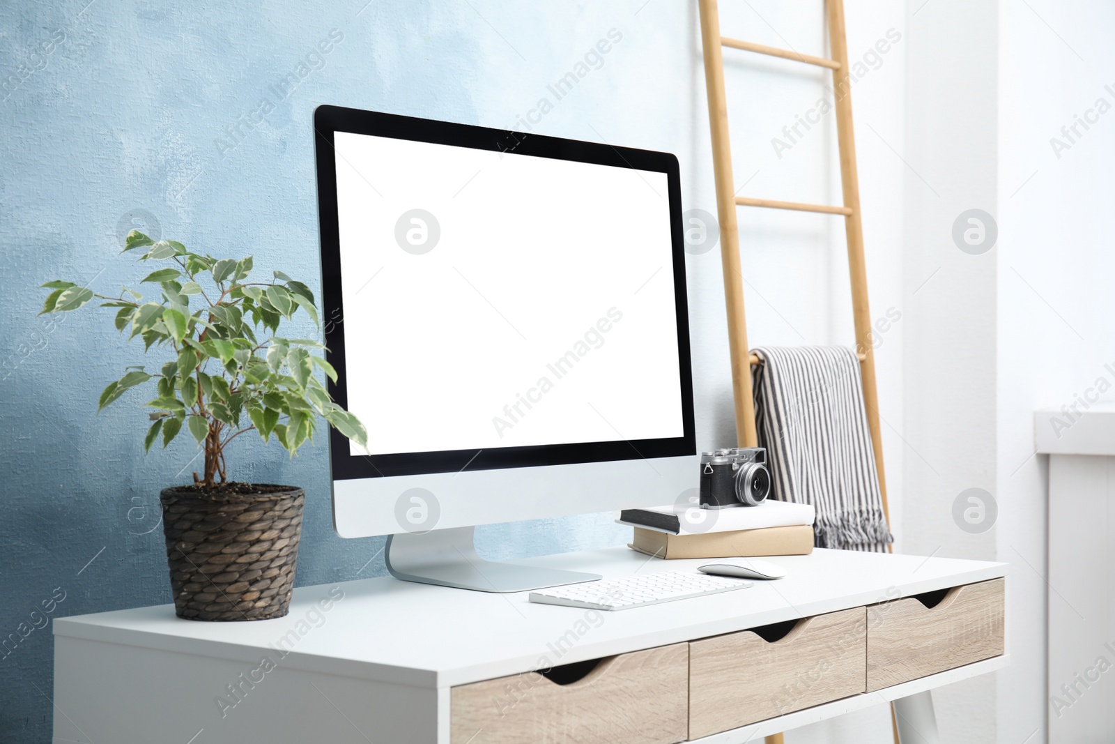 Photo of Comfortable workplace with modern computer on table