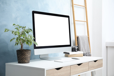 Photo of Comfortable workplace with modern computer on table