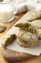 Tasty matcha cookies on wooden table, closeup