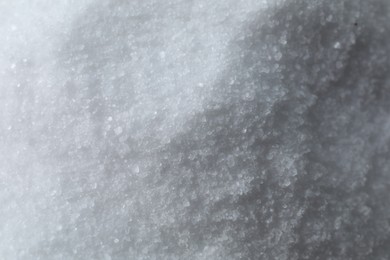 Photo of Organic white sea salt as background, closeup