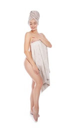 Full length portrait of young pretty woman with towels on white background