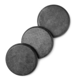 Photo of Group of grey stones on white background, top view