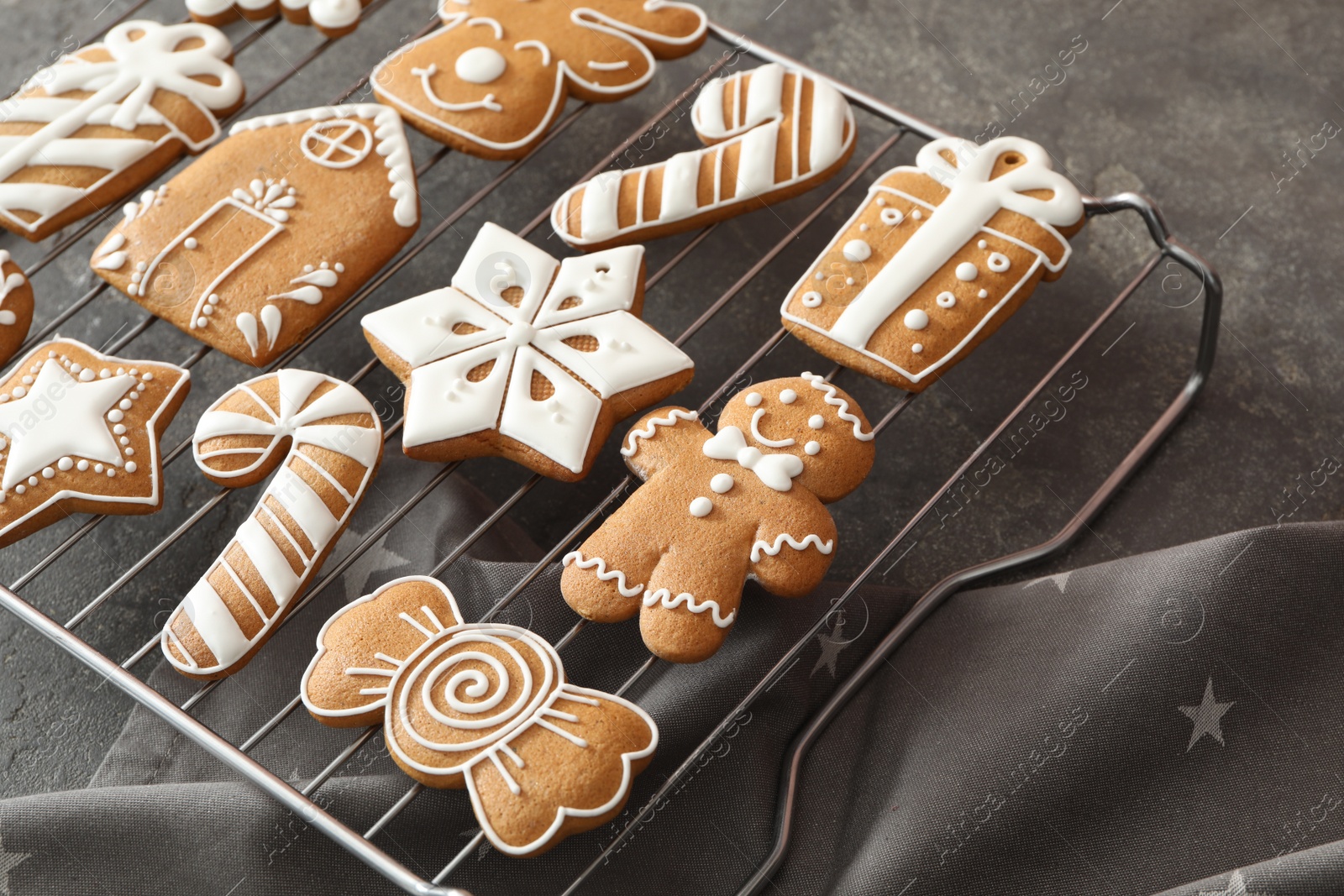 Photo of Delicious homemade Christmas cookies on grey table