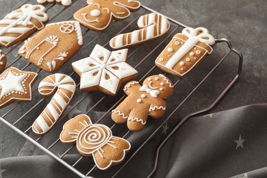 Photo of Delicious homemade Christmas cookies on grey table