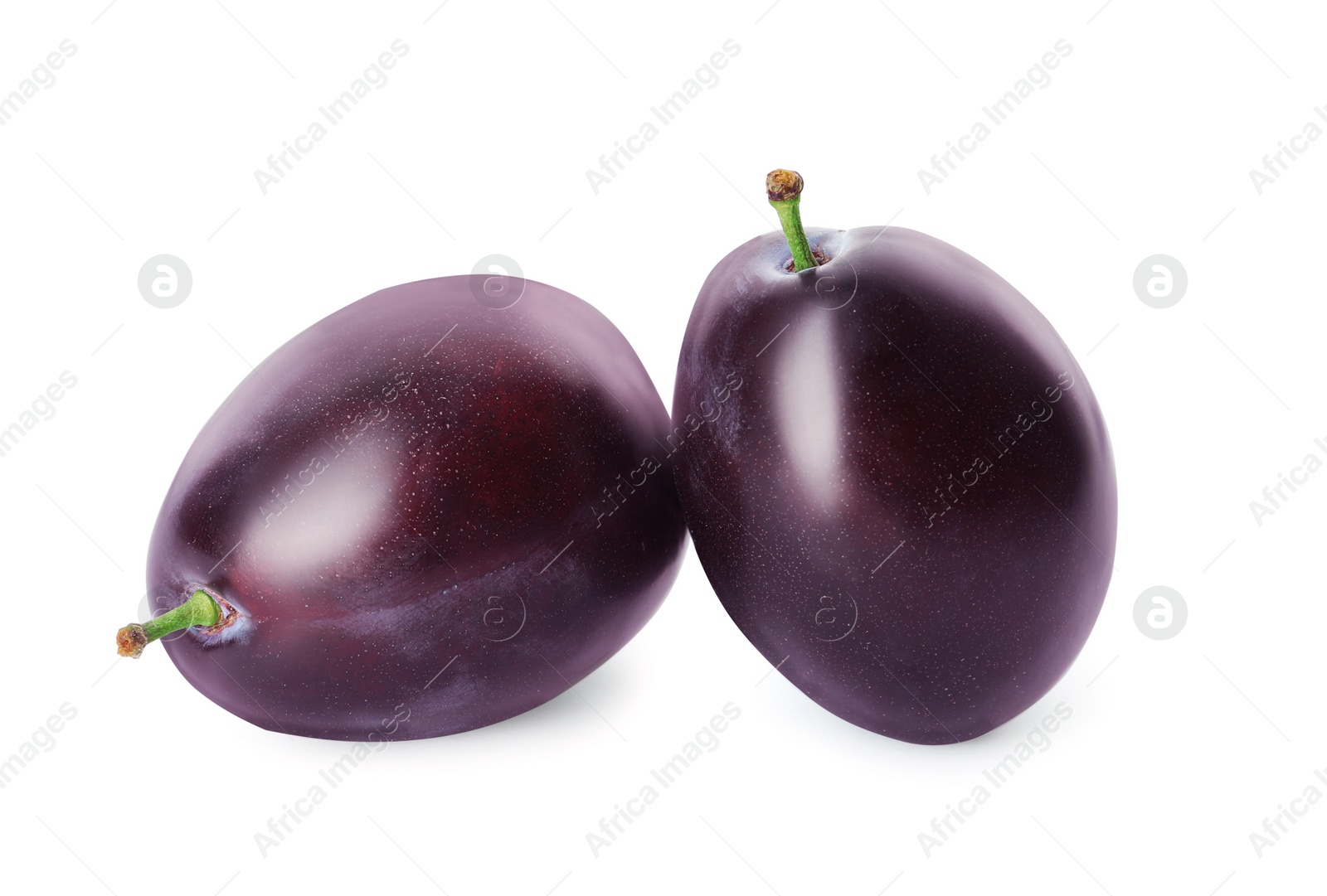 Photo of Delicious fresh ripe plums on white background