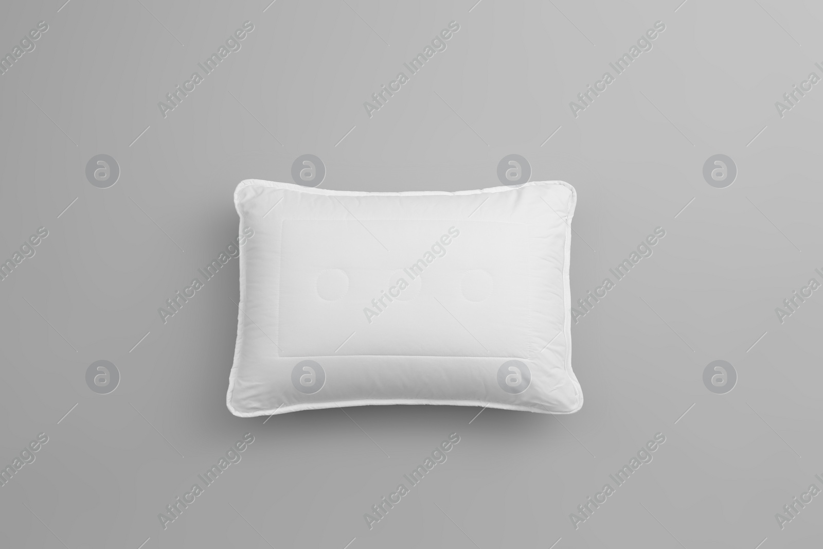 Photo of Clean soft bed pillow on grey background, top view