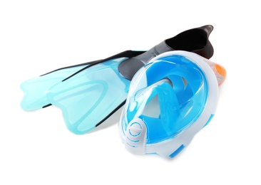 Photo of Pair of flippers and diving mask on white background