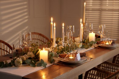 Festive table setting with beautiful tableware and decor indoors