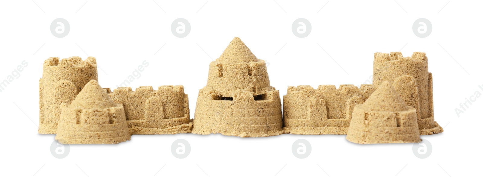 Photo of Beautiful sand castle isolated on white. Outdoor play