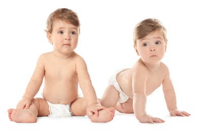 Image of Portrait of cute twin babies on white background