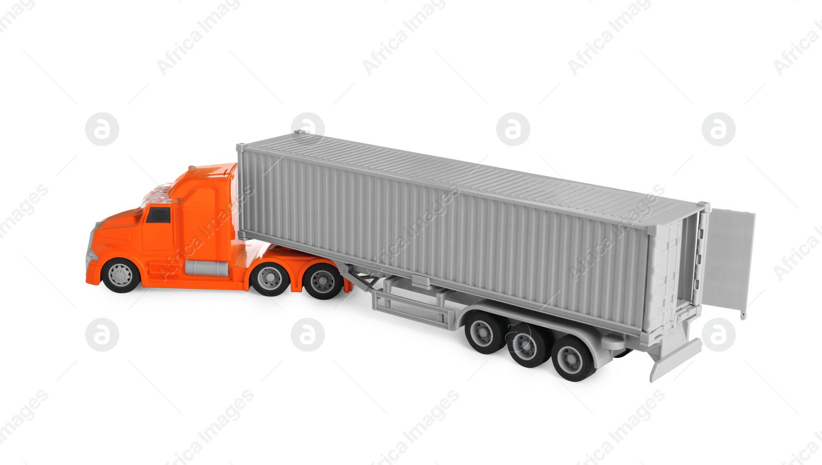 Photo of Toy truck with open container isolated on white. Export concept