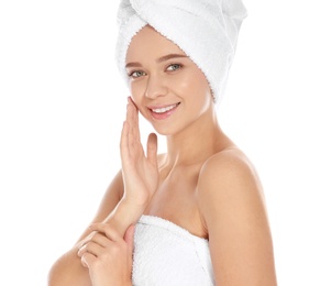 Photo of Portrait of young pretty woman with towels on white background