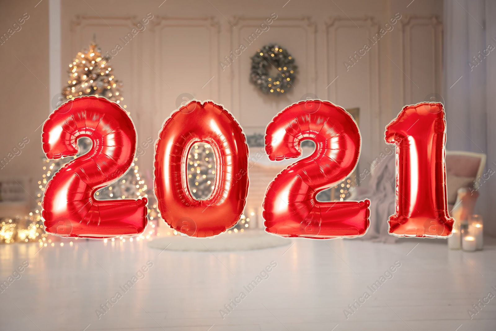 Image of Red foil 2021 balloons in festive room interior 